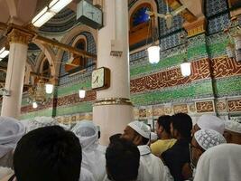 Medina, Saudi Arabia, May 2023 - Muslim pilgrims are going to visit Roza Rasool at Masjid Al Nabawi Medina. photo