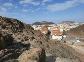 Medina, Saudi Arabia, April 2023 - Beautiful daytime view of mountains and clear sky in Medina, Saudi Arabia. photo