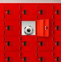 Soccer ball in red locker or gym locker in room photo