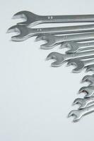 Set of tools for repair in a case on a white background. Assorted work or construction tools. Wrenches, Pliers, screwdriver. Top view photo