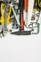 Set of tools for repair in a case on a white background. Assorted work or construction tools. Wrenches, Pliers, screwdriver. Top view photo