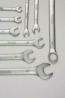 Set of tools for repair in a case on a white background. Assorted work or construction tools. Wrenches, Pliers, screwdriver. Top view photo