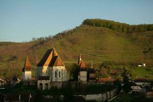 Biertan a very beautiful medieval village in Transylvania, Romania. A historical town in Romania that has preserved the Frankish and Gothic architectural style. Travel photo. photo