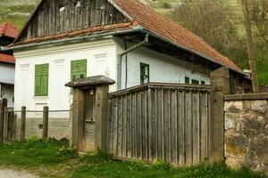 Rimetea is a small village located in Transylvania, Romania. It is situated in the Apuseni Mountains and is known for its picturesque setting and well preserved Hungarian architectural style. photo