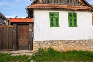 Rimetea is a small village located in Transylvania, Romania. It is situated in the Apuseni Mountains and is known for its picturesque setting and well preserved Hungarian architectural style. photo