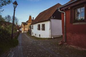 A beautiful medieval citadel city of Sighisoara in the heart of Romania, Transylvania travel destination in Eastern Europe. photo