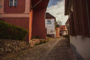 A beautiful medieval citadel city of Sighisoara in the heart of Romania, Transylvania travel destination in Eastern Europe. photo