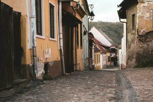 A beautiful medieval citadel city of Sighisoara in the heart of Romania, Transylvania travel destination in Eastern Europe. photo