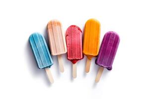 Assortment of cold summer popsicles isolated on a white background. photo