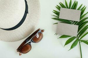 Summer, spring business style, business card on palm leaf. photo