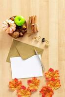 Thanksgiving autumn background, envelop, greeting and pen. photo