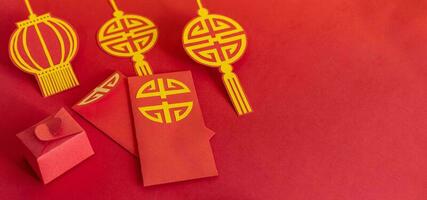 Chinese new year red packet, flat lay, hand made, paper cut. photo