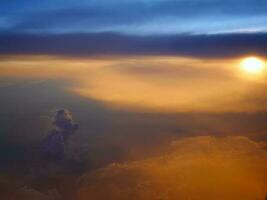 Aerial view of dramatic blue sky and dark clouds in the evening dawn, sunset, cloudscape, skyscape, silhouette clouds, nature background photo