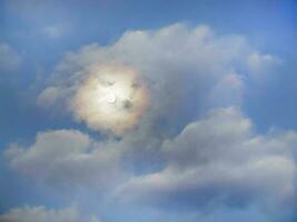 Blurry halo full moon, bright moon ring in the twilight sky, lunar in the dark clouds, moon light,  Serenity nature background photo