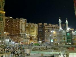 Mecca, Saudi Arabia, June 2023 - At night, there is a large number of pilgrims from all over the world in the outer courtyard of Masjid Al Haram. photo