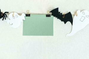 Modern background with black bats and spider, white ghost. photo