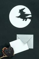 Halloween party invitation card mockup. Flat lay, top view, copy space. photo