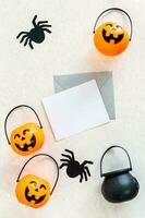 Blank white halloween card with pumpkins and spiders. Banner invitation mockup. photo