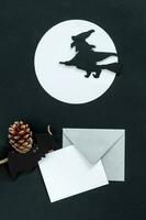 Halloween party invitation card mockup. Flat lay, top view, copy space. photo