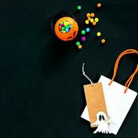 Happy halloween on black background. Special offer label. Celebration concept. Discount offer price. photo