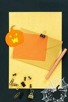 Halloween holiday invitation with pumpkin. photo