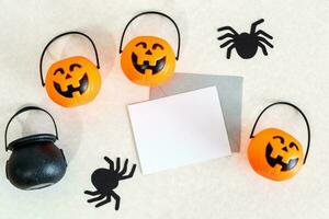 Blank white halloween card with pumpkins and spiders. Banner invitation mockup. photo