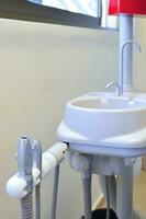 Dental instruments and tools in a dentists office photo