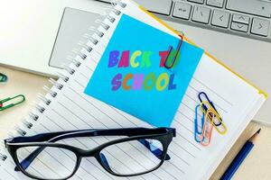 Back to school. College student's desk. photo