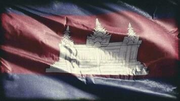 Retro aged Cambodia flag waving on the wind. Old vintage Cambodian banner swaying on the breeze. Seamless loop. video