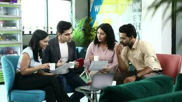 Cheerful Office Workers Discussing Their Project and drinking Cup Of Coffee video