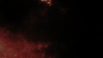 Halftone dots Fire clouds smoke with orange color over black background video