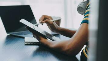 Portrait of Asian young female working on laptop at office video