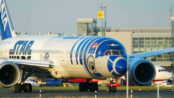 DUSSELDORF, GERMANY JULY 21, 2017 - ANA Boeing 787 Dreamliner in Star Wars livery waiting at start position before departure. Dusseldorf airport, Germany video