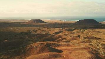 Flying over an island with extinct volcanoes. video