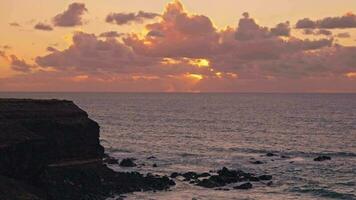 Photo shoot on the ocean, silhouettes of people at sunset video