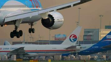 AMSTERDAM, THE NETHERLANDS JULY 25, 2017 - TUI Fly Boeing 787 Dreamliner PH TFK approaching and landing at runway 06 Kaagbaan at sunrise. Shiphol Airport, Amsterdam, Holland video