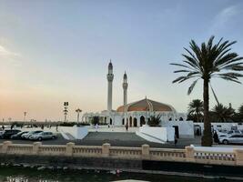 Jeddah, Saudi Arabia, June 2023 - A beautiful view of the sunset at Jeddah Corniche in the evening. photo