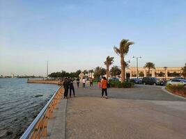 Jeddah, Saudi Arabia, June 2023 - A beautiful evening view of the Public Park on the Jeddah Corniche. This park is located right next to the sea. photo
