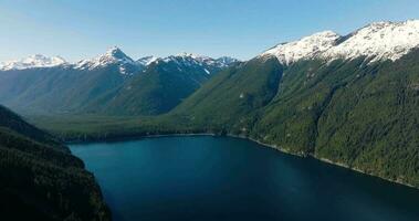 Aerial landscape view of Chilliwack Lake and mountains in spring. video