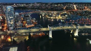 Aerial view on downtown of Vancouver at night, Granville bridge and False Creek video