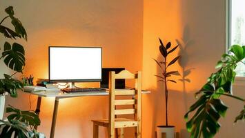 screen mockup computer pc, Desktop workspace with connect to laptop with HDMI cable split monitor leaving space for text And stacks of books on white table, pine chairs photo