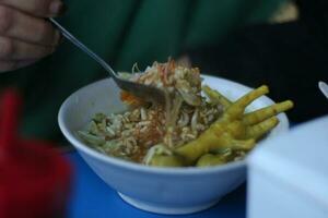 Enjoy a delicious Indonesian dish of Soto Ceker, served in the morning. photo