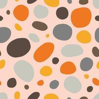 Abstract polka dot orang, gray, brown color seamless pattern on light pink background. Vector illustration.