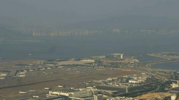 HONG KONG NOVEMBER 09, 2019 - Aerial view timelapse of Hong Kong International Airport Chek Lap Kok, view from Lantau Island video