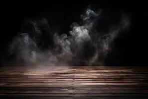 A table with smoke coming out of it and a black background. photo