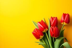 Orange tulips over yellow surface, easter. birthday, mother day greeting card concept with copy space. top view, flat lay. for banner. AI generated photo