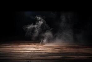 A table with smoke coming out of it and a black background. photo