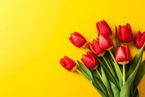 Orange tulips over yellow surface, easter. birthday, mother day greeting card concept with copy space. top view, flat lay. for banner. AI generated photo