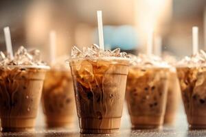 stock photo of Iced coffee in plastic cups with strawflying food photography