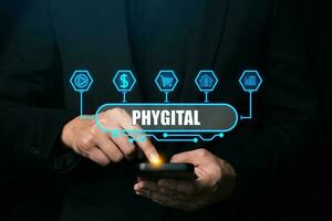 Phygital marketing involves merging tangible physical and the digital physical and digital experiences. photo